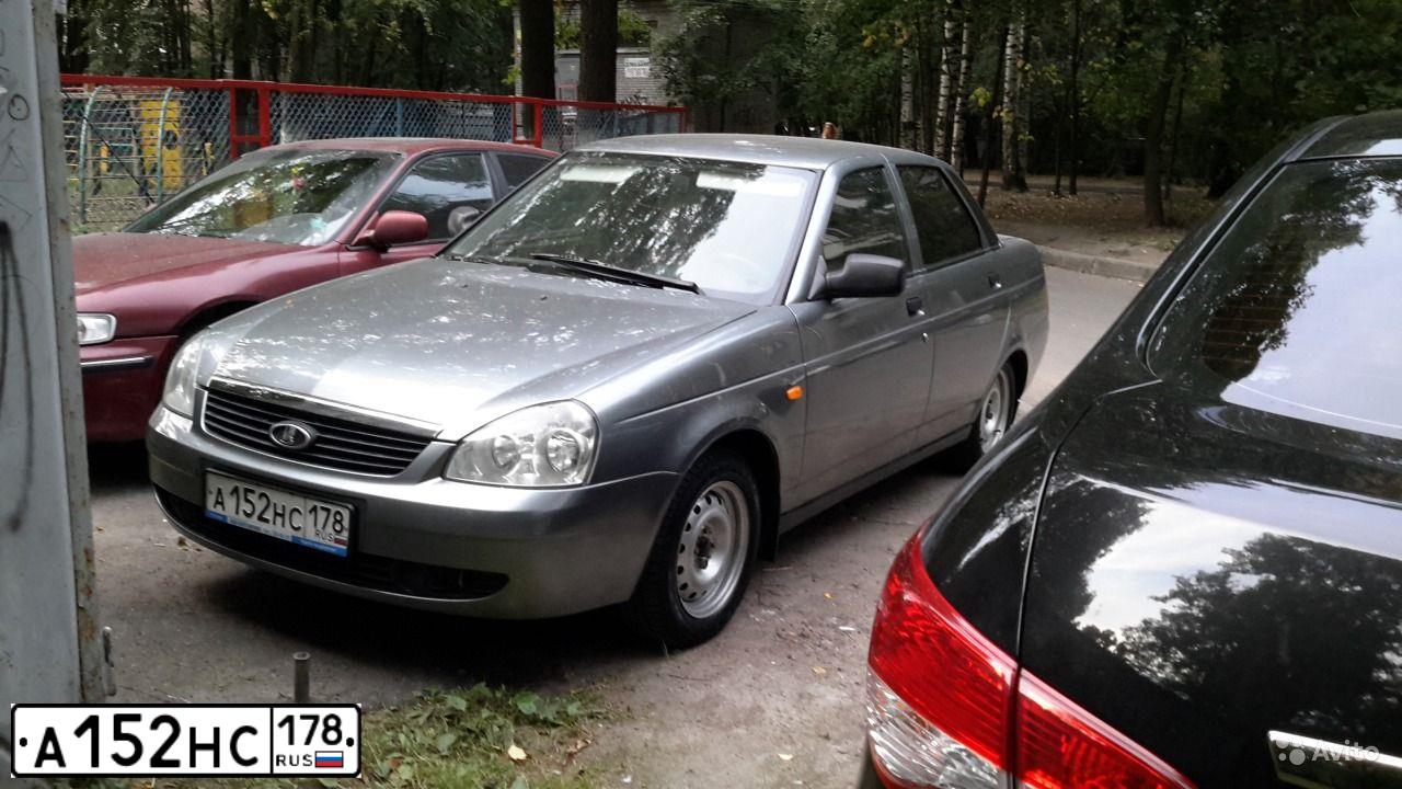 Фото автомобиля LADA 2170 PRIORA, 2008 — госномер А152НС178. Цвет: средний серо-зеленый металлик