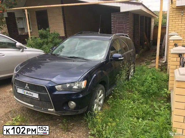 Фото автомобиля MITSUBISHI OUTLANDER, 2012 — госномер К102РМ152. Цвет: синий