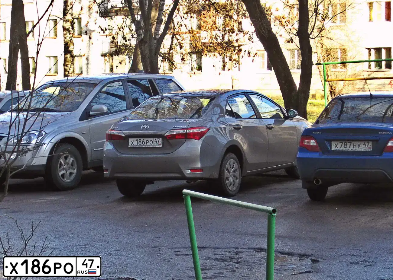 Фото автомобиля TOYOTA COROLLA, 2013 — госномер К320НУ702. Цвет: бронзовый
