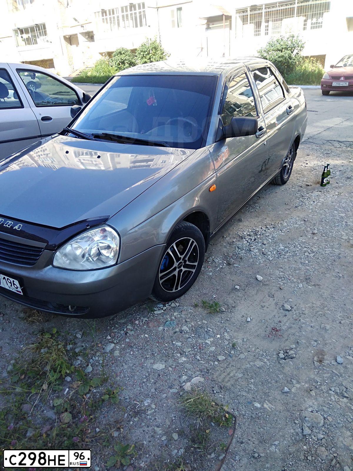 Фото автомобиля MITSUBISHI LANCER, 2005 — госномер Р588ВО196. Цвет: Красный