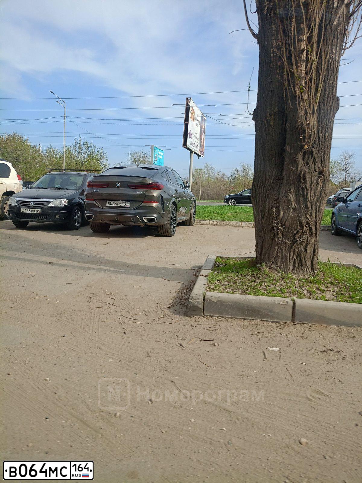 Фото автомобиля BMW X5, 2014 — госномер М549ХА164. Цвет: Темно-синий