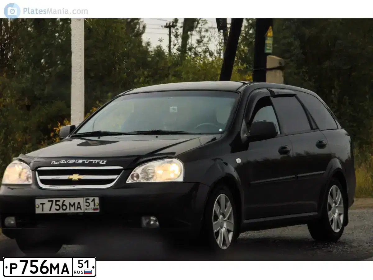 Фото автомобиля RENAULT LOGAN, 2010 — госномер С248КУ51. Цвет: СИНИЙ