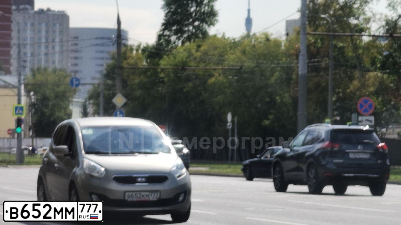 Фото автомобиля KIA SPORTAGE, 2014 — госномер В652ММ777. Цвет: СИНИЙ