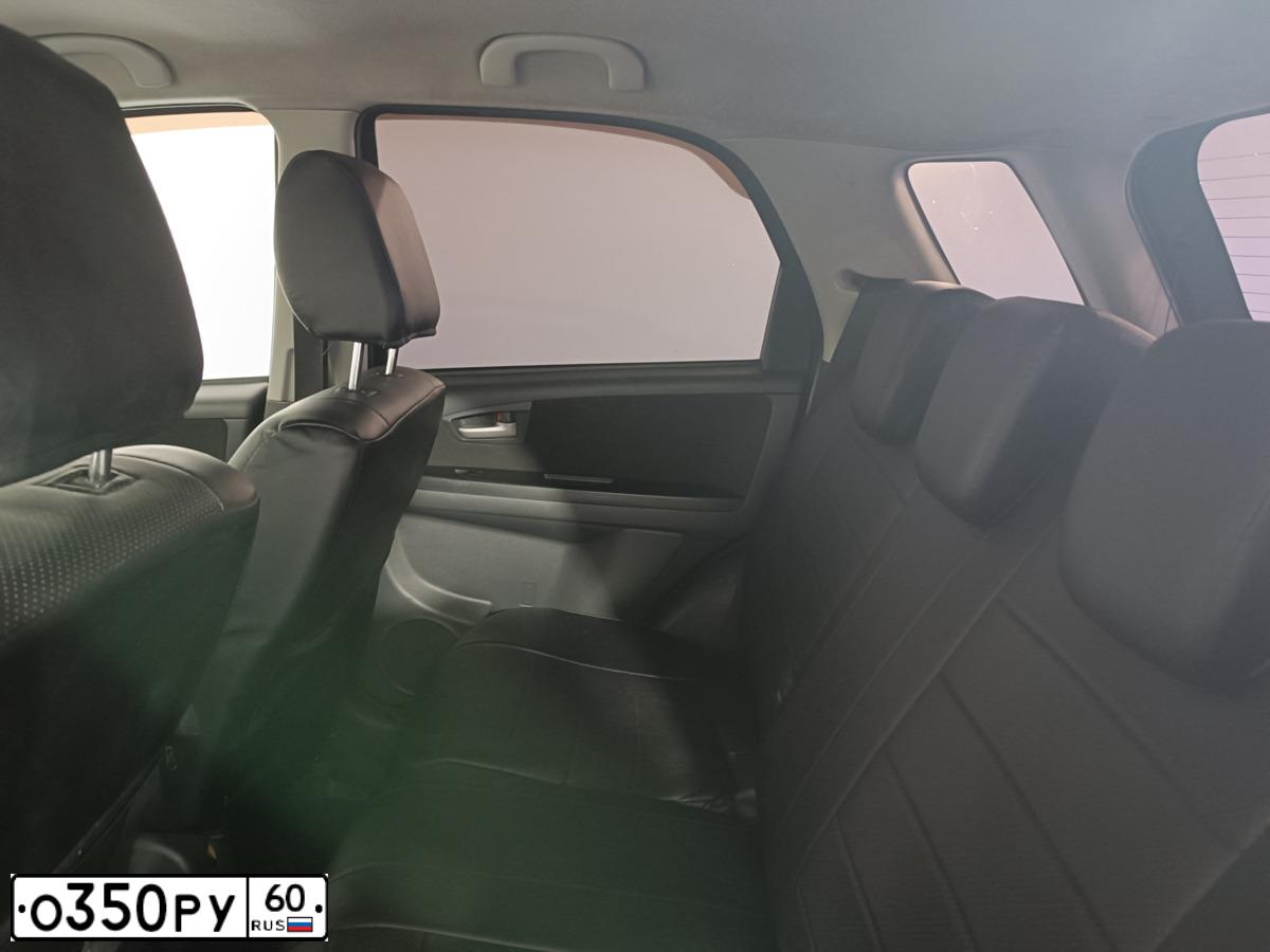 Фото автомобиля SUZUKI SX 4, 2007 — госномер О151РУ98. Цвет: СЕРЫЙ
