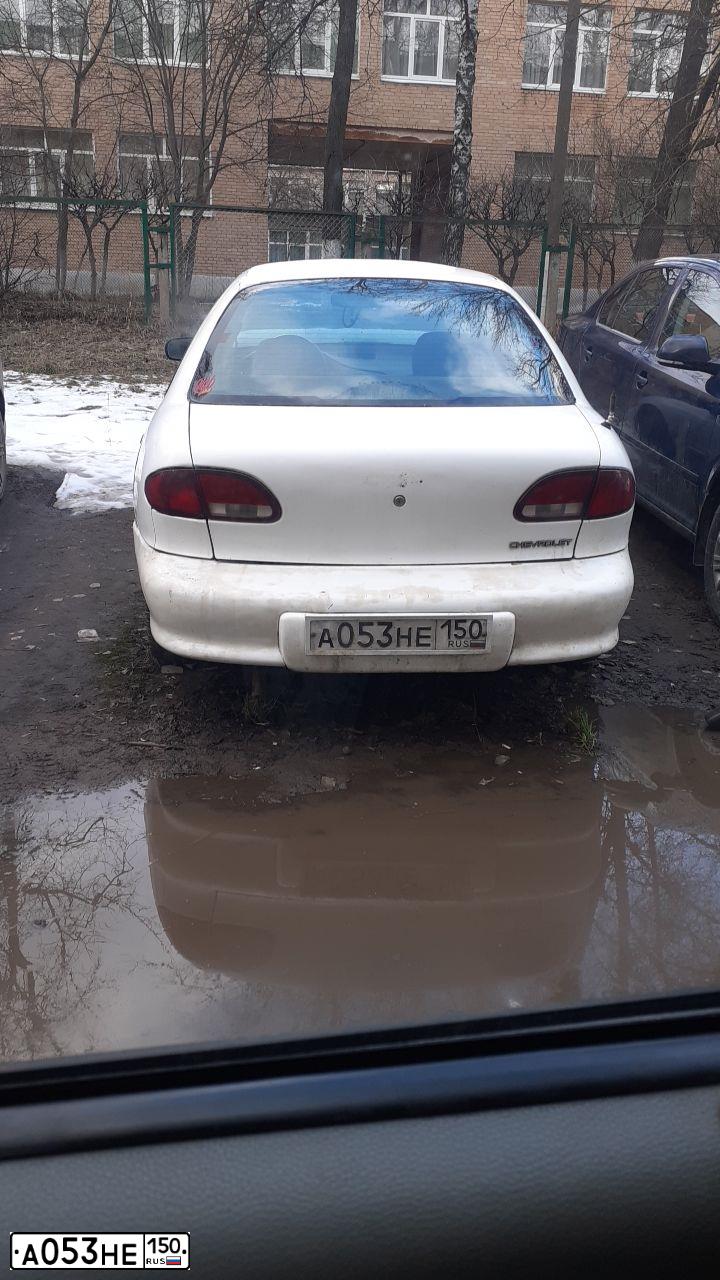 Фото автомобиля CHEVROLET CAVALIER, 1996 — госномер В865ОР77. Цвет: Белый