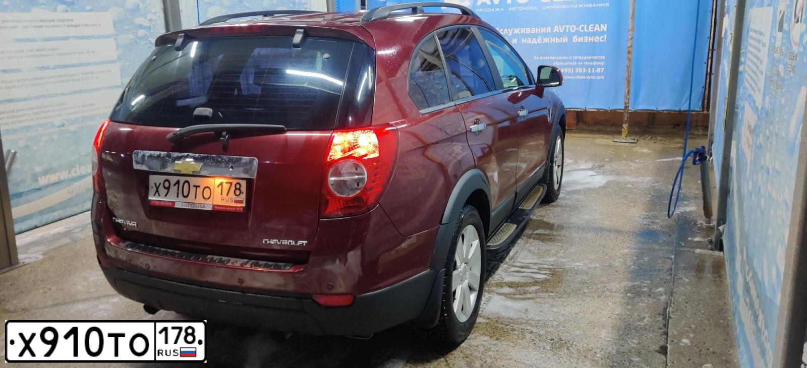 Фото автомобиля CHEVROLET T CAPTIVA, 2007 — госномер Н999ЕМ47. Цвет: Красный
