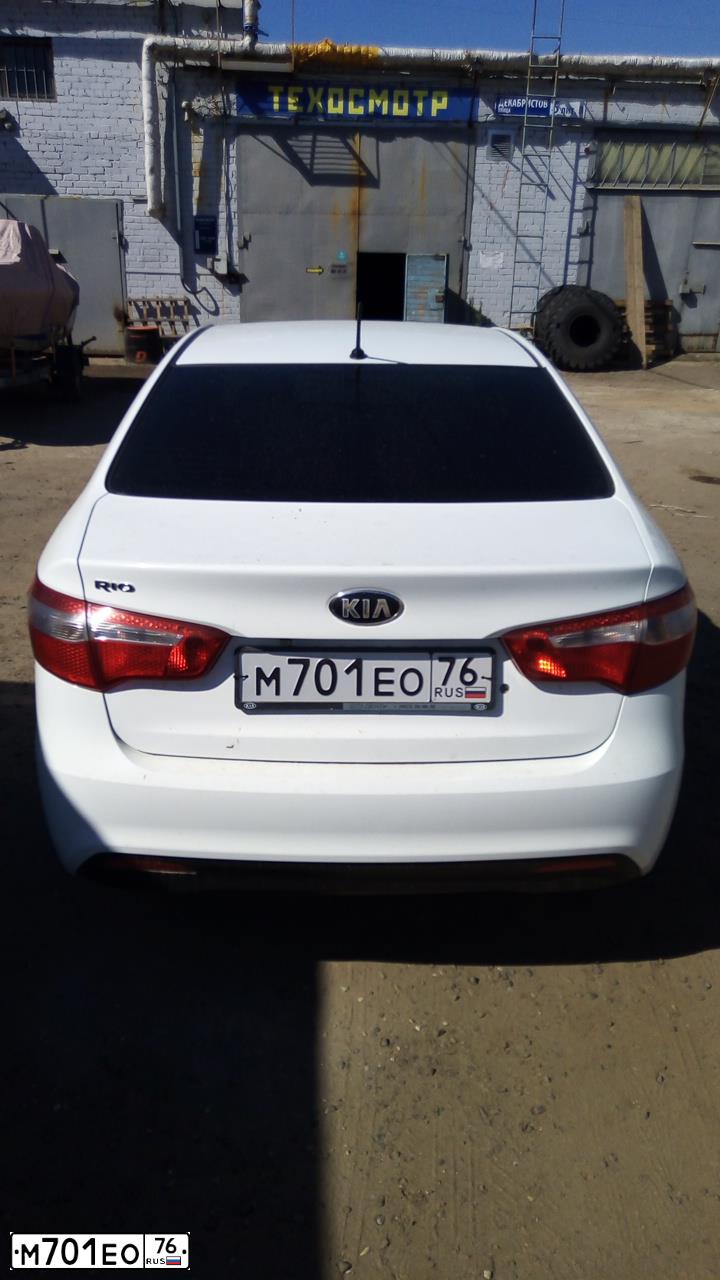 Фото автомобиля KIA RIO, 2014 — госномер М701ЕО76. Цвет: БЕЛЫЙ