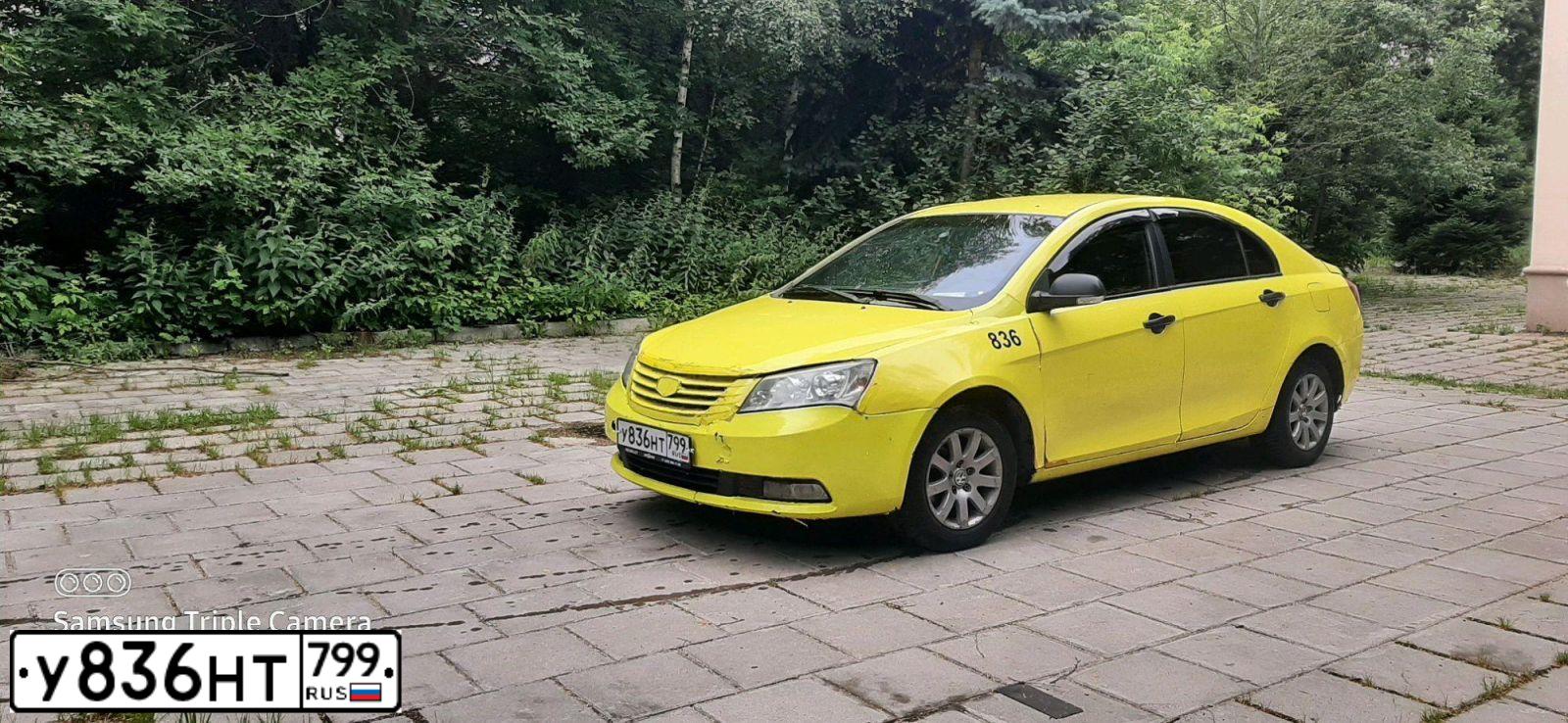Фото автомобиля GEELY EMGRAND, 2014 — госномер Т371СК196. Цвет: ЧЕРНЫЙ