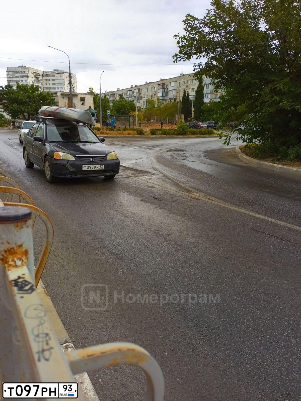 Фото автомобиля HONDA CIVIC, 2001 — госномер Т097РН93. Цвет: ЧЕРНЫЙ