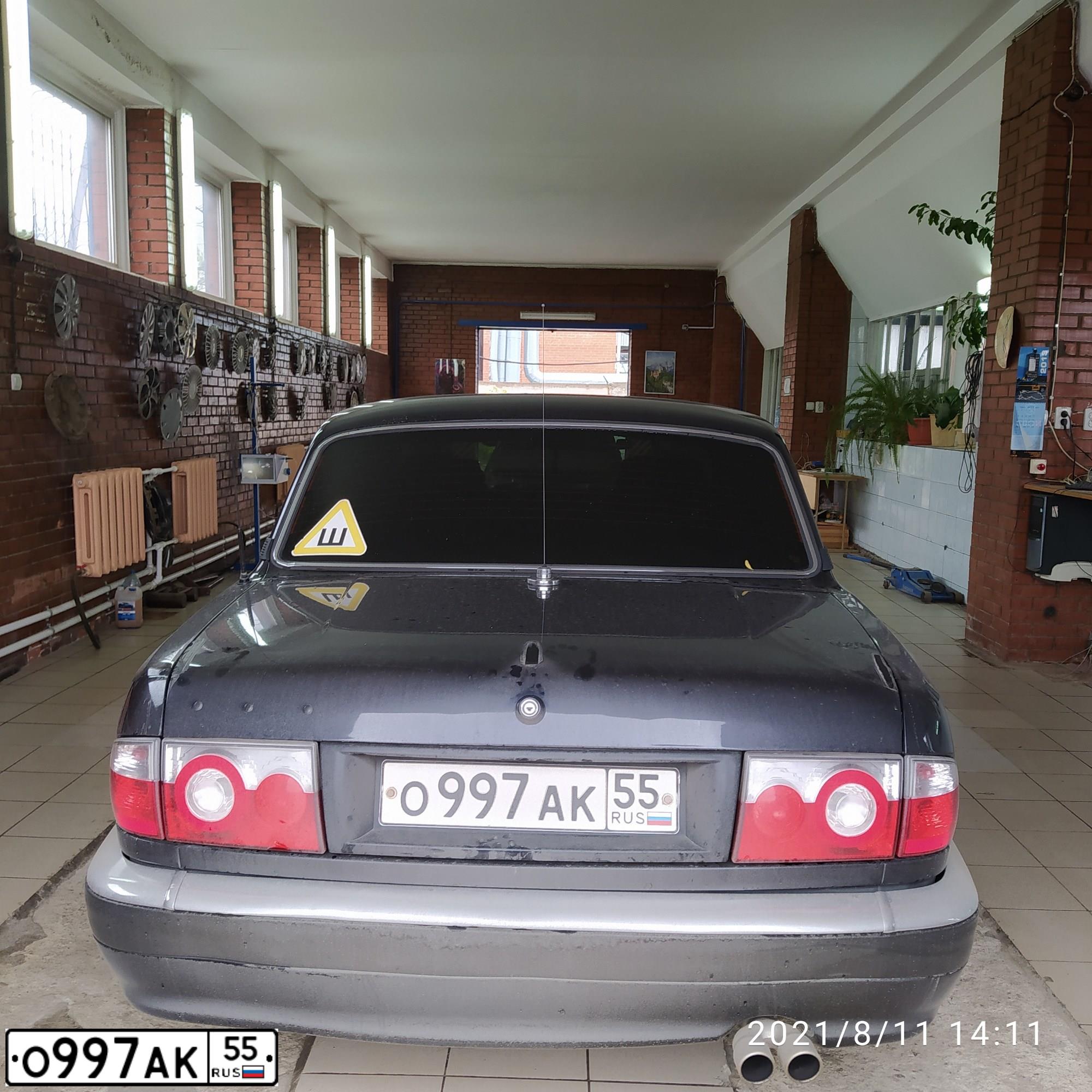 Фото автомобиля GAZ 3110 WOLGA, 2008 — госномер О997АК55. Цвет: ЧЕРНО-СИНИЙ