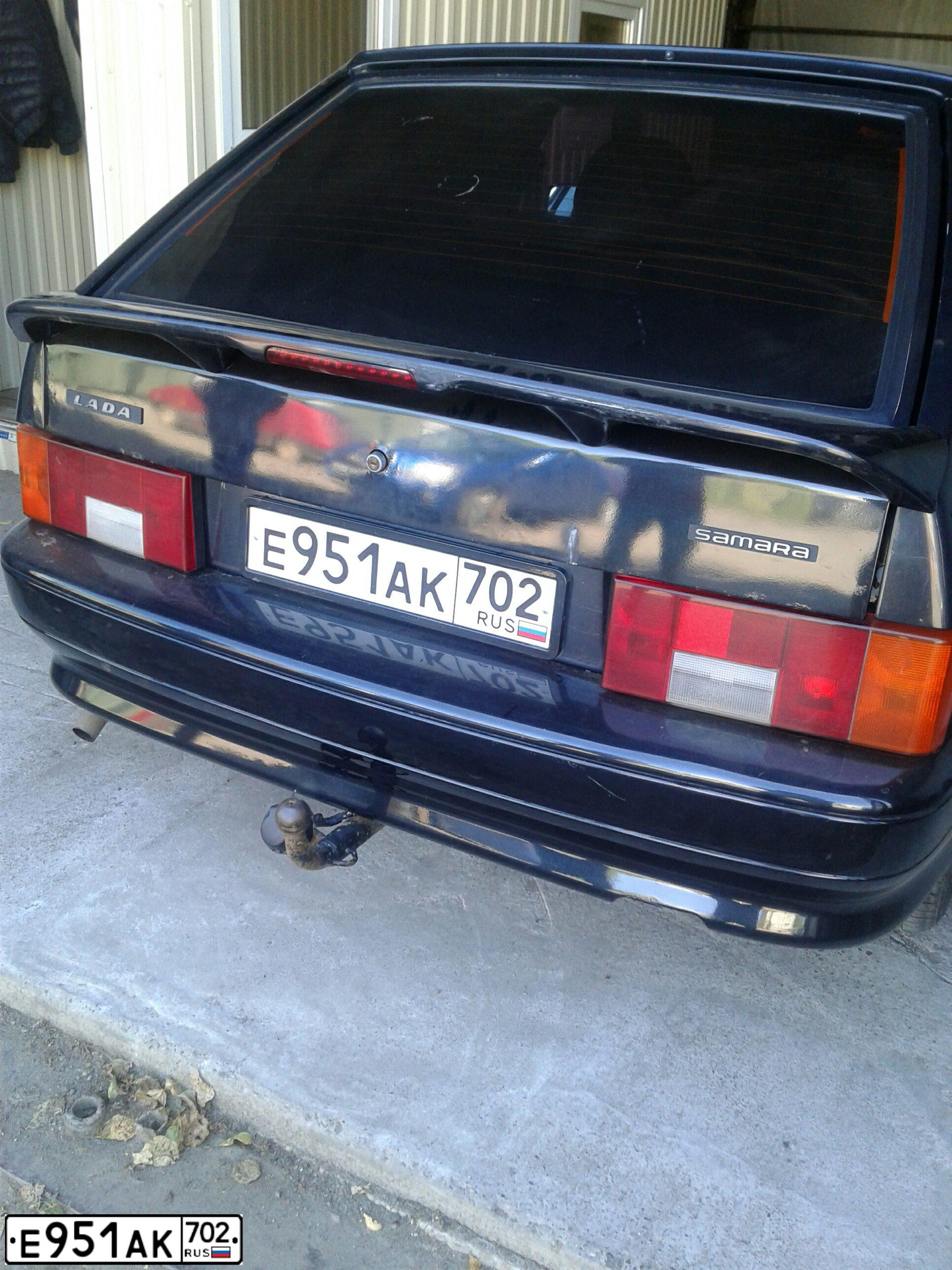 Фото автомобиля LADA 2114 SAMARA, 2007 — госномер Е951АК702. Цвет: ГРАФИТОВЫЙ МЕТАЛИК