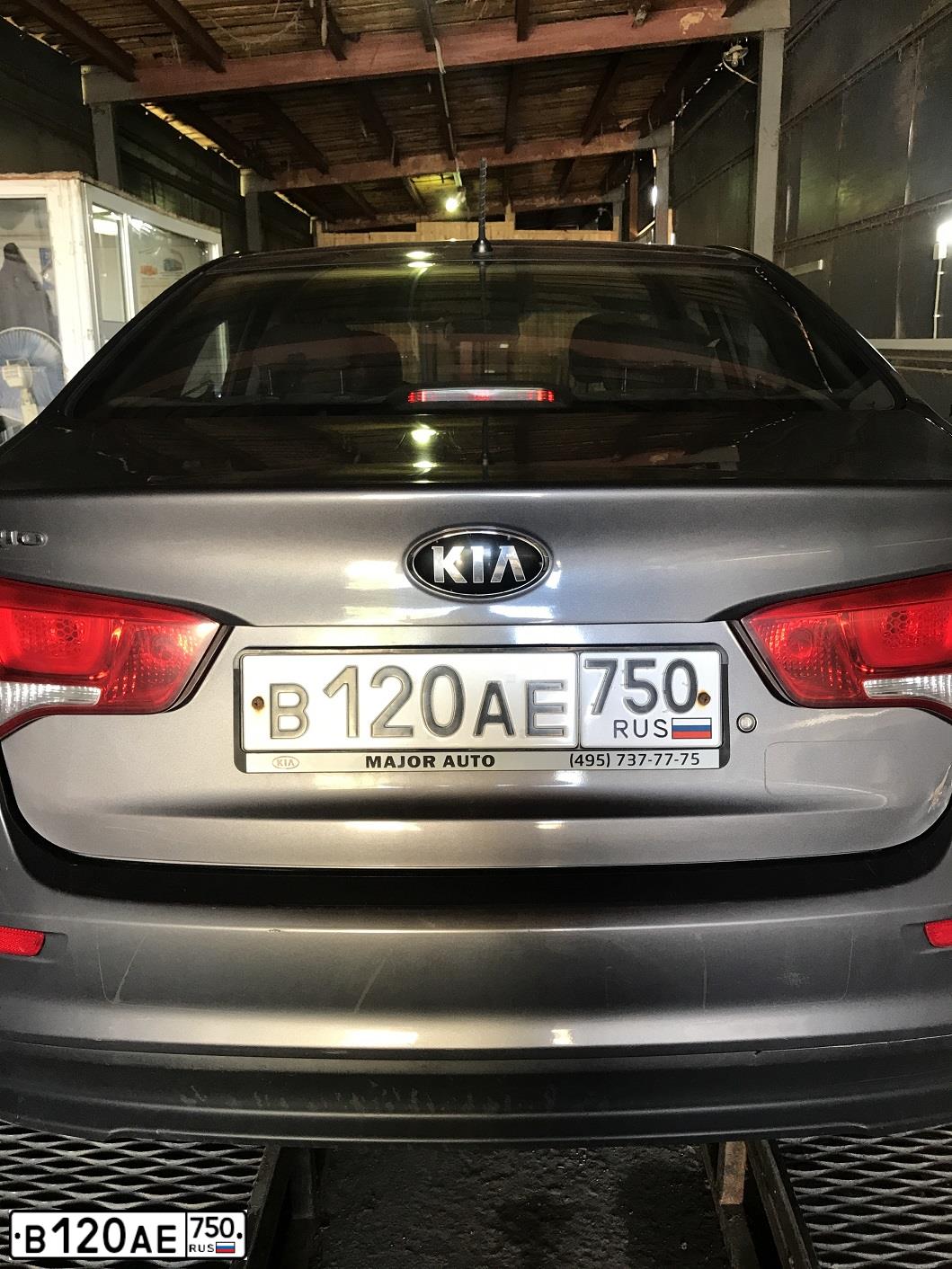 Фото автомобиля KIA RIO, 2015 — госномер Т074ЕО58. Цвет: ТЕМНО-СЕРЫЙ