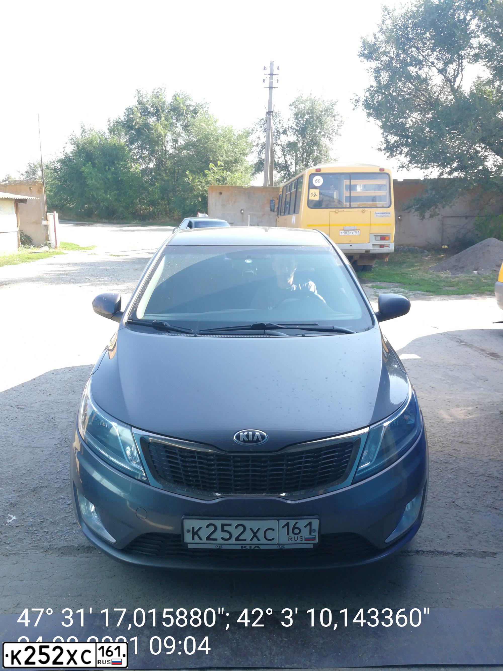 Фото автомобиля KIA RIO, 2014 — госномер К252ХС161. Цвет: Серый