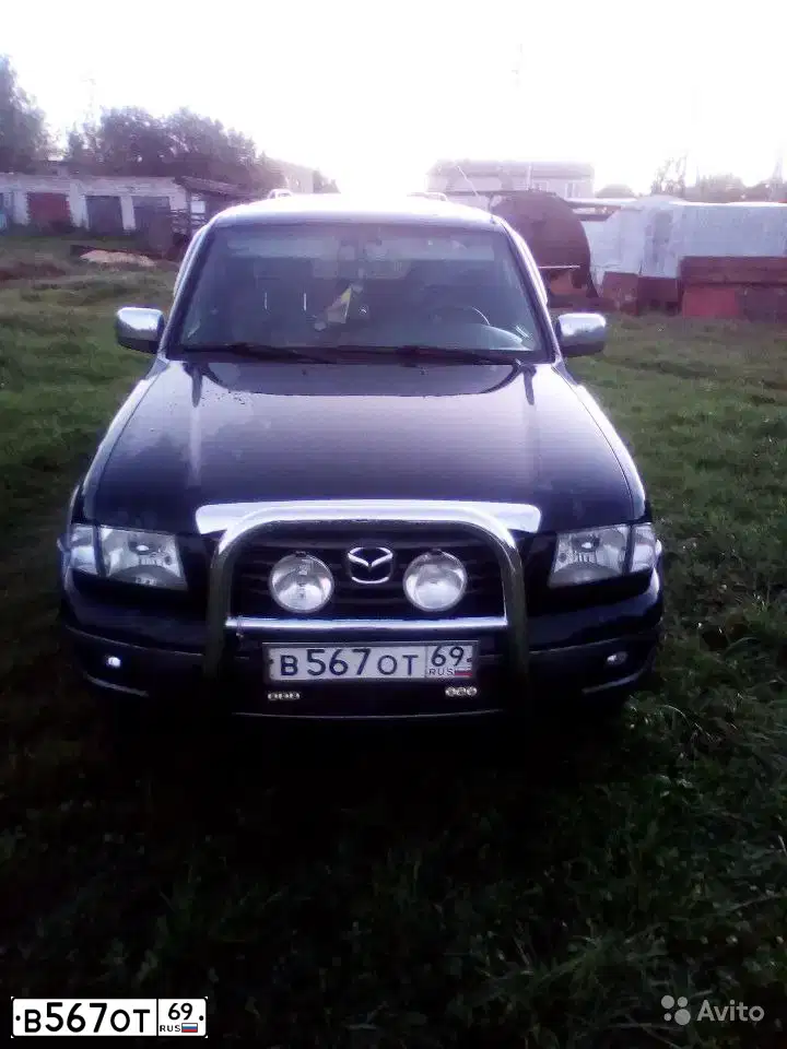 Фото автомобиля MAZDA B-SERIE, 2005 — госномер В567ОТ69. Цвет: ЧЕРНЫЙ