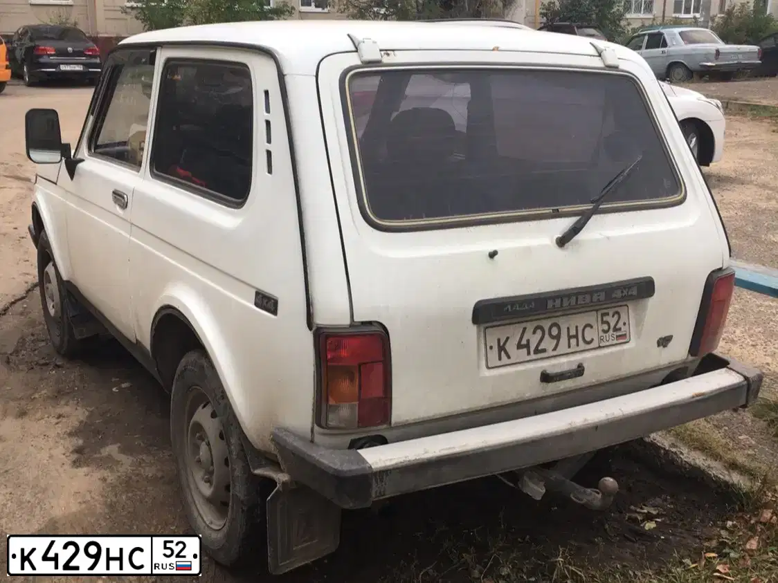 Фото автомобиля LADA 2121 NIVA, 1999 — госномер К429НС52. Цвет: БЕЛЫЙ