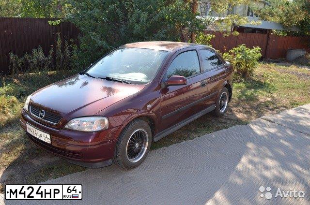 Фото автомобиля OPEL ASTRA, 2002 — госномер М438ЕВ177. Цвет: ТЕМНО КРАСНЫЙ