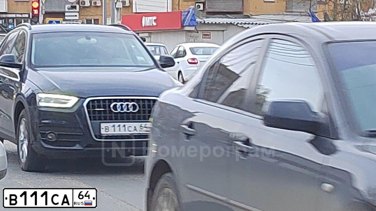 Фото автомобиля AUDI Q3, 2014 — госномер В111СА64. Цвет: ТЕМНО СИНИЙ