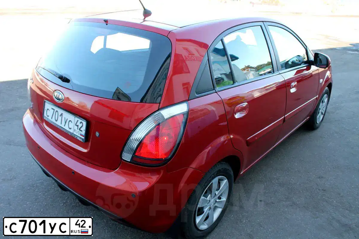 Фото автомобиля KIA RIO, 2011 — госномер С701УС42. Цвет: Красный