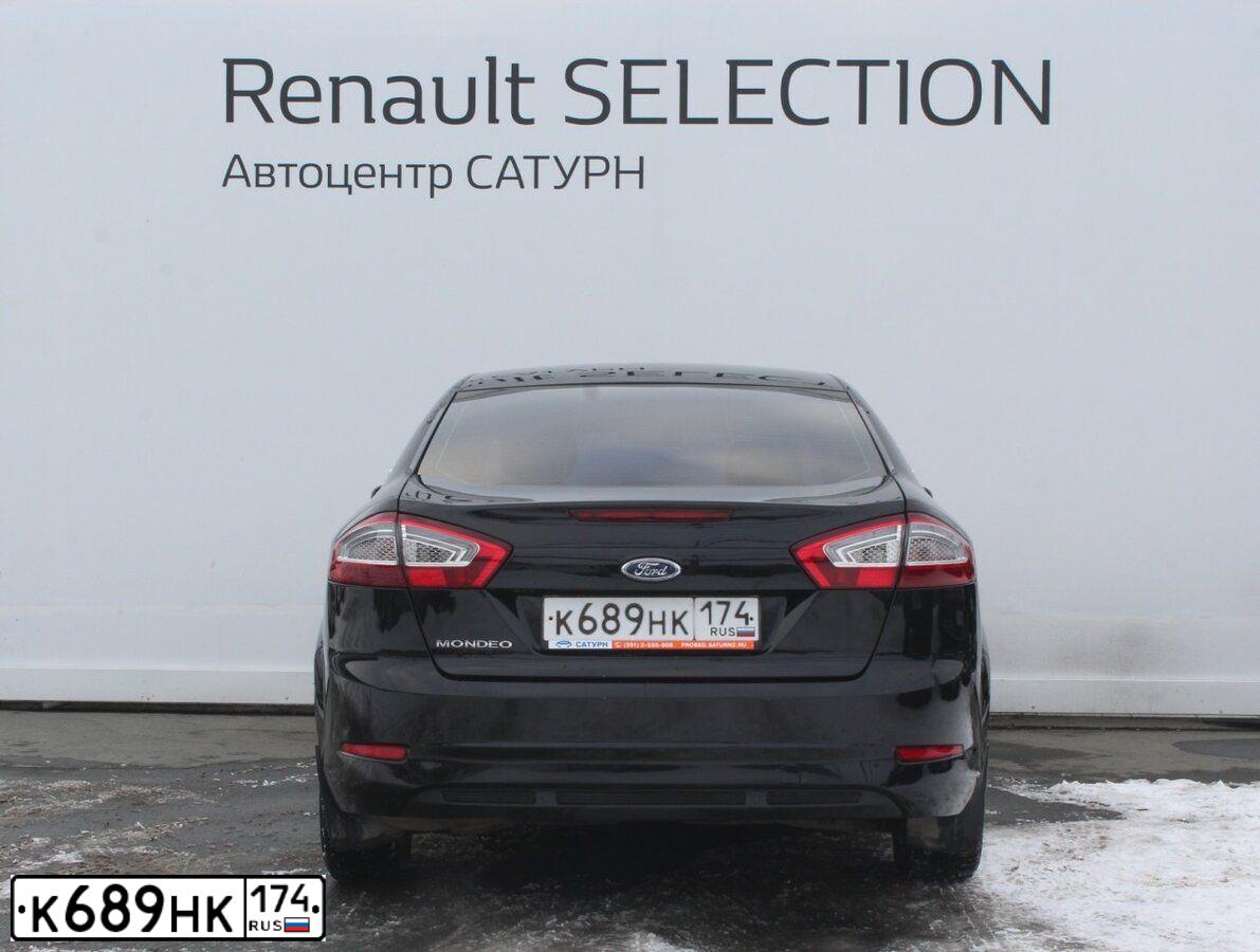 Фото автомобиля FORD MONDEO, 2010 — госномер М113АХ774. Цвет: ЧЕРНЫЙ