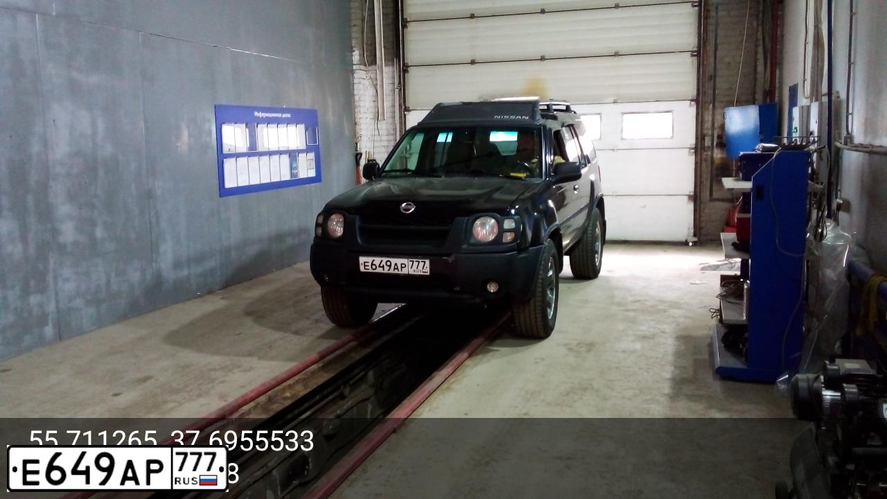 Фото автомобиля NISSAN XTERRA/PALADIN/, 2002 — госномер Е649АР777. Цвет: ЧЕРНЫЙ