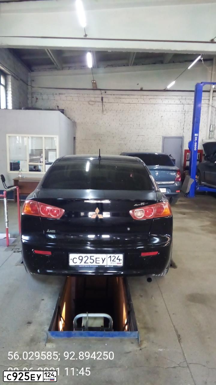 Фото автомобиля MITSUBISHI LANCER, 2008 — госномер О415КР134. Цвет: ЧЕРНЫЙ