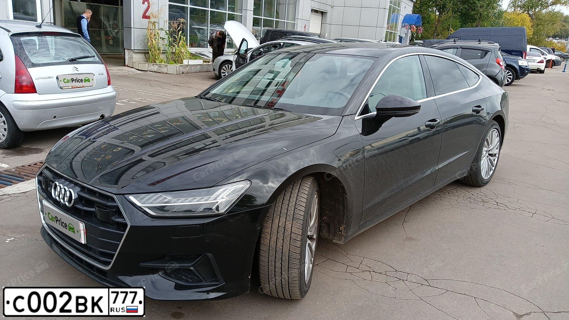 Фото автомобиля AUDI A7, 2015 — госномер С002ВК777. Цвет: ЧЕРНЫЙ