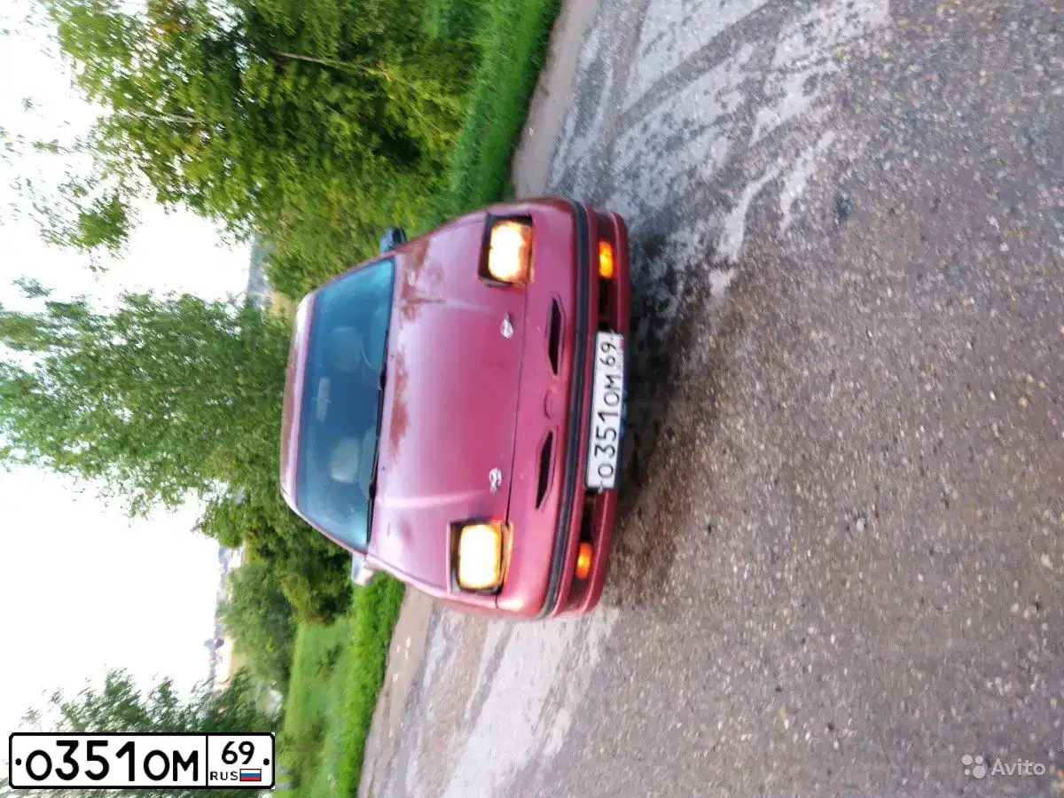 Фото автомобиля FORD PROBE, 1989 — госномер Т099НО150. Цвет: КРАСНЫЙ