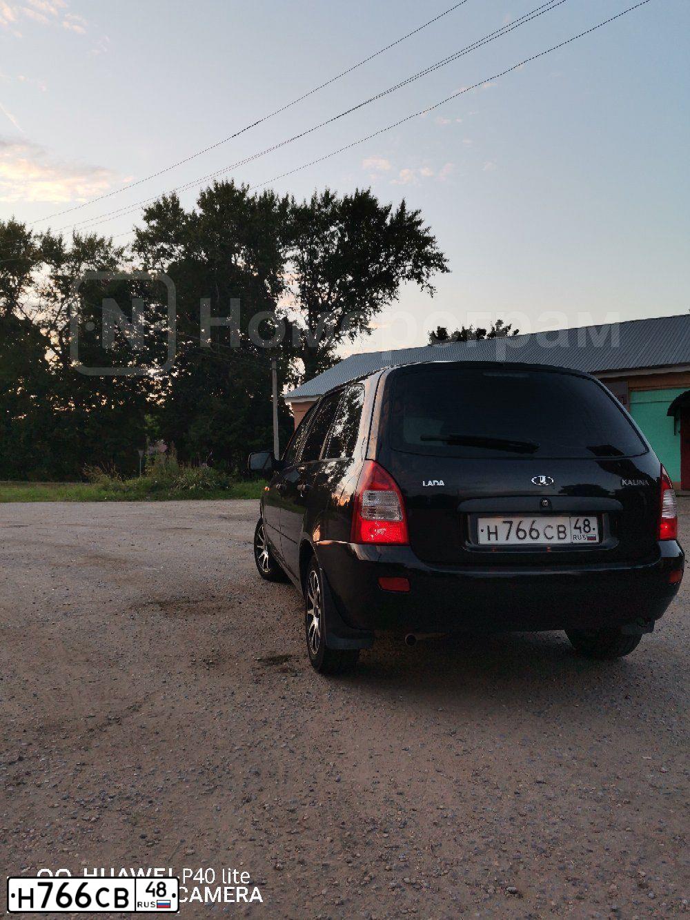 Фото автомобиля LADA 1117 KALINA, 2011 — госномер Н766СВ48. Цвет: СИНЕ-ЧЕРНЫЙ
