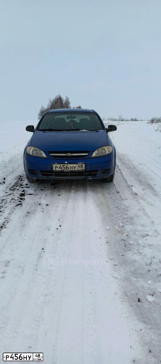 Фото автомобиля CHEVROLET LACETTI, 2009 — госномер Р456НУ48. Цвет: синий