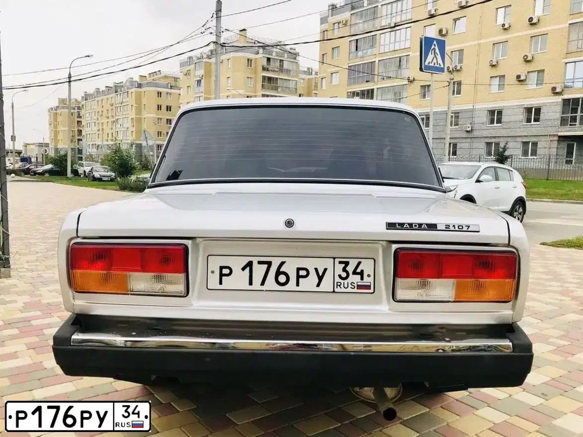 Фото автомобиля LADA 2107, 2011 — госномер Е717НК134. Цвет: СВЕТЛО-СЕРЕБРИСТЫЙ МЕТАЛЛ