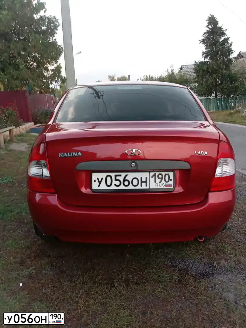 Фото автомобиля LADA 1118 KALINA, 2011 — госномер М170КУ82. Цвет: Красный