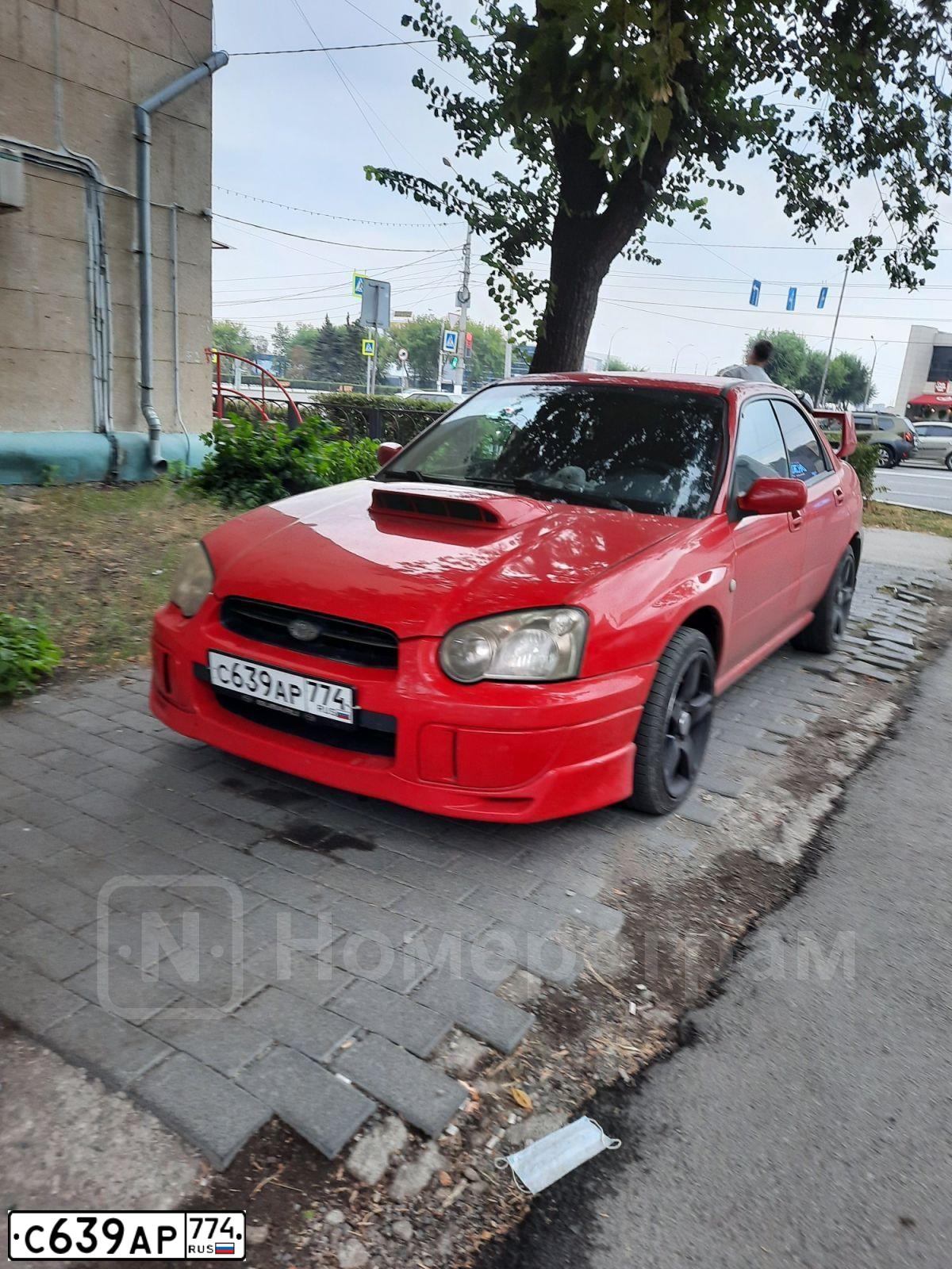 Фото автомобиля SUBARU IMPREZA, 2005 — госномер В723ОУ156. Цвет: Красный
