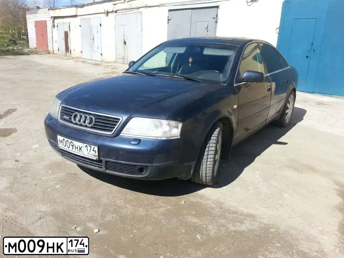 Фото автомобиля AUDI A6, 1998 — госномер О162МА154. Цвет: синий