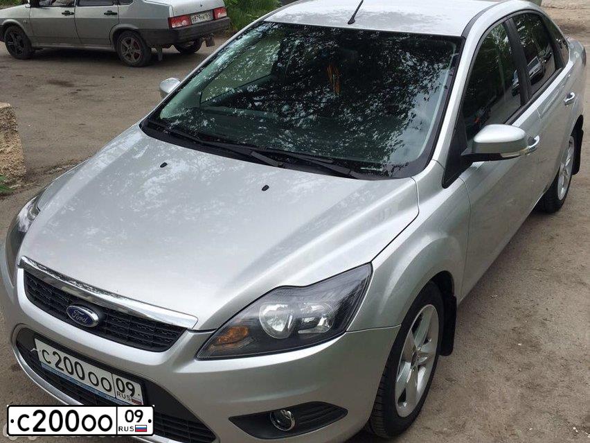 Фото автомобиля FORD D FOCUS, 2010 — госномер С200ОО09. Цвет: Серебристый