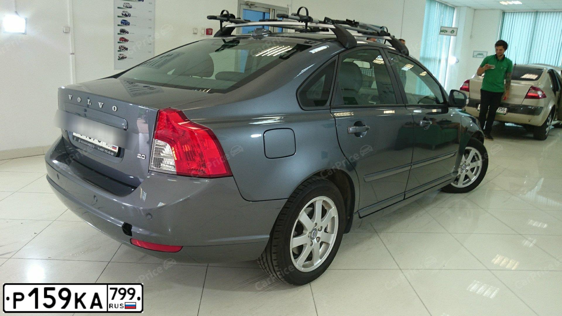 Фото автомобиля VOLVO S40, 2012 — госномер Р159КА799. Цвет: ТЕМНО-СЕРЫЙ