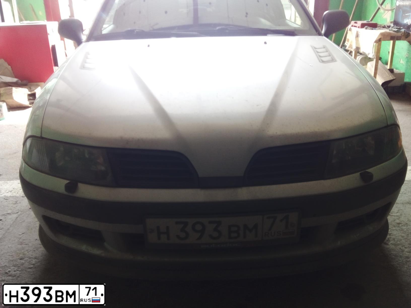 Фото автомобиля MITSUBISHI CARISMA, 2002 — госномер О053КЕ71. Цвет: Серебристый