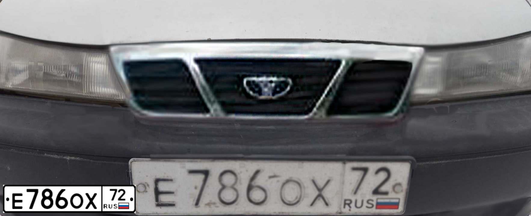 Фото автомобиля DAEWOO NEXIA, 2006 — госномер Е786ОХ72. Цвет: серебристый