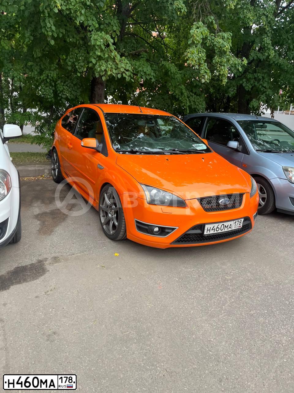 Фото автомобиля FORD FOCUS, 2007 — госномер Н460МА178. Цвет: ОРАНЖЕВЫЙ