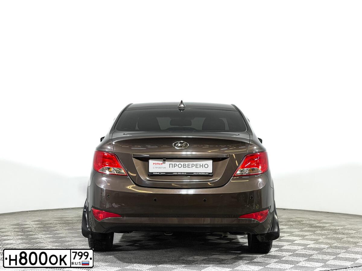 Фото автомобиля HYUNDAI SOLARIS, 2016 — госномер В727РХ777. Цвет: Коричневый