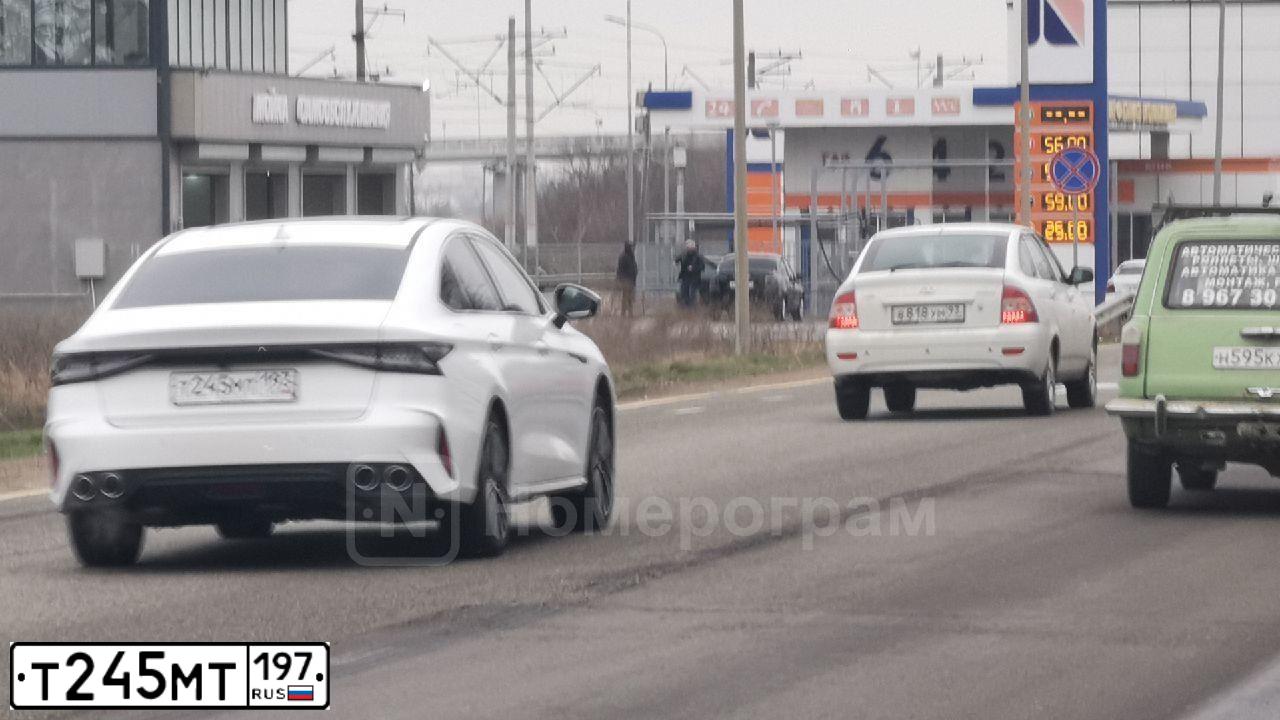 Фото автомобиля JAGUAR X-TYPE, 2008 — госномер Т245МТ197. Цвет: КРАСНЫЙ