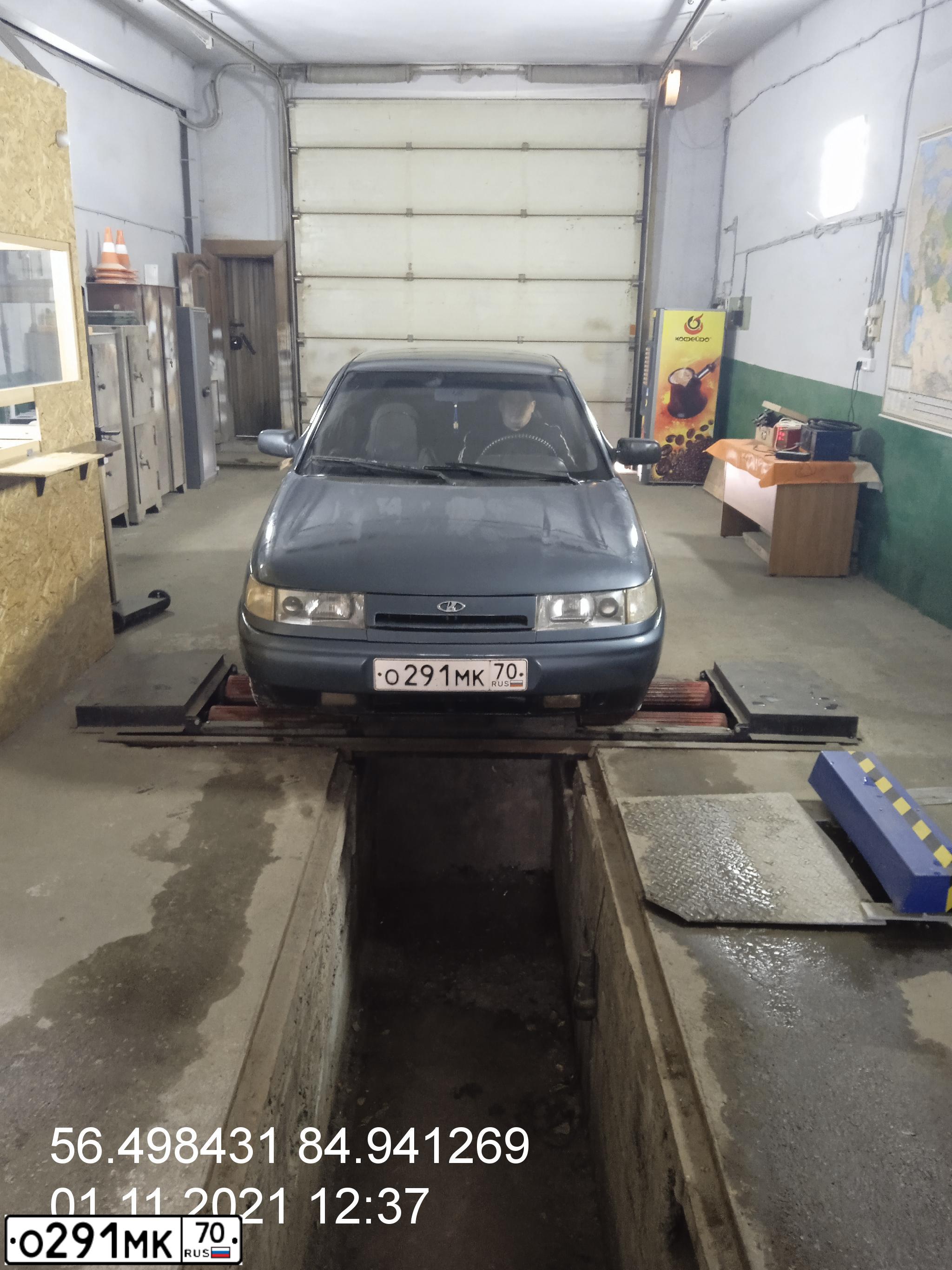 Фото автомобиля LADA 2112 LADA, 2001 — госномер Н931УА70. Цвет: СЕРО-СИНИЙ