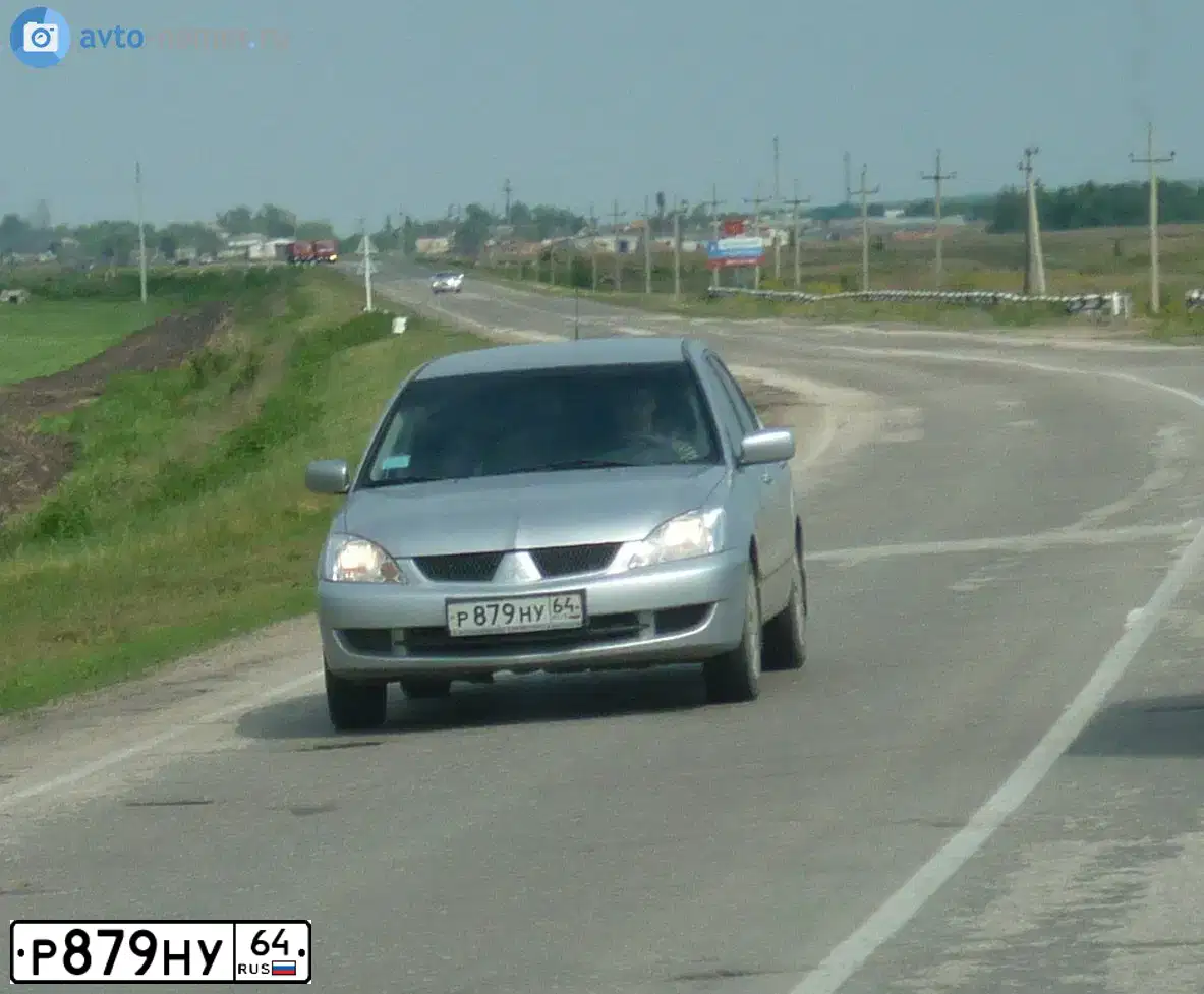 Фото автомобиля МIТSUВISНI LАNСЕR1.6, 2009 — госномер Е171МС64. Цвет: СЕРЕБРИСТЫЙ