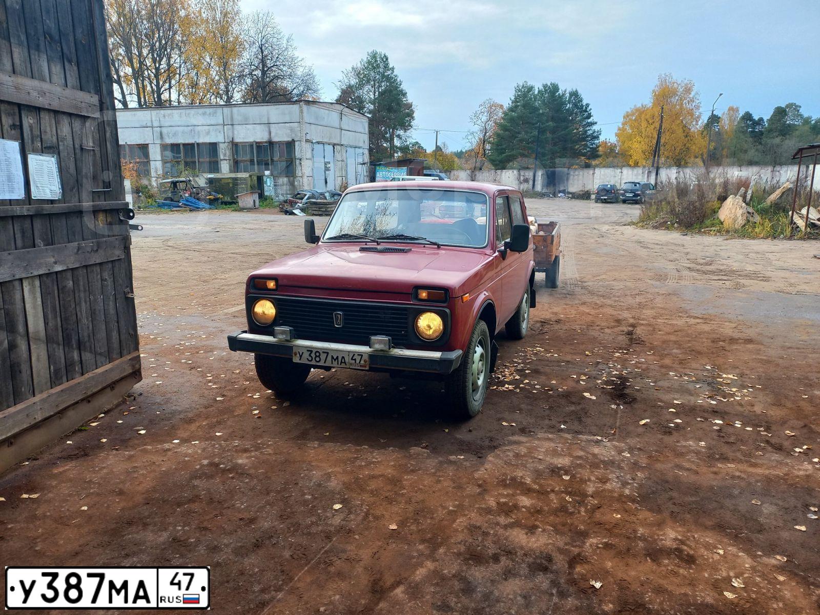 Фото автомобиля LADA 2121 NIVA, 1997 — госномер У387МА47. Цвет: ВИШНЕВЫЙ