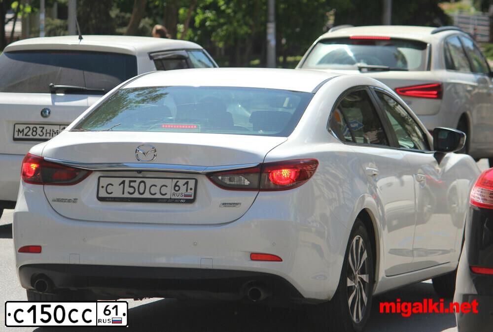 Фото автомобиля PEUGEOT 308, 2010 — госномер А245АА161. Цвет: СЕРО-БЕЖЕВЫЙ