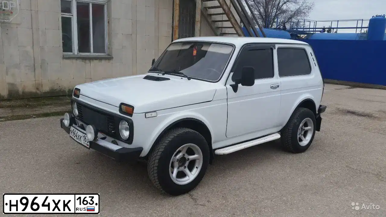 Фото автомобиля LADA NIVA, 2003 — госномер Н758АМ82. Цвет: ЯРКО-БЕЛЫЙ