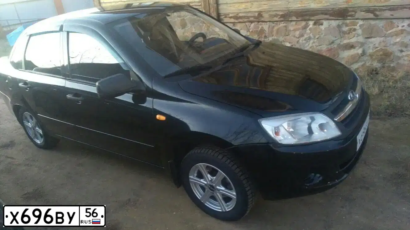 Фото автомобиля LADA 2190 GRANTA, 2012 — госномер Х696ВУ56. Цвет: ЧЕРНЫЙ