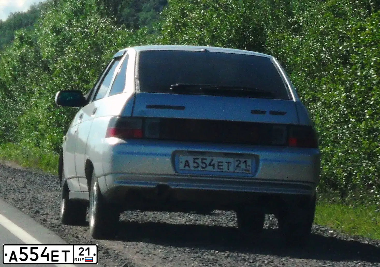 Фото автомобиля LADA 2112, 2006 — госномер А554ЕТ21. Цвет: СЕРЕБРИСТЫЙ