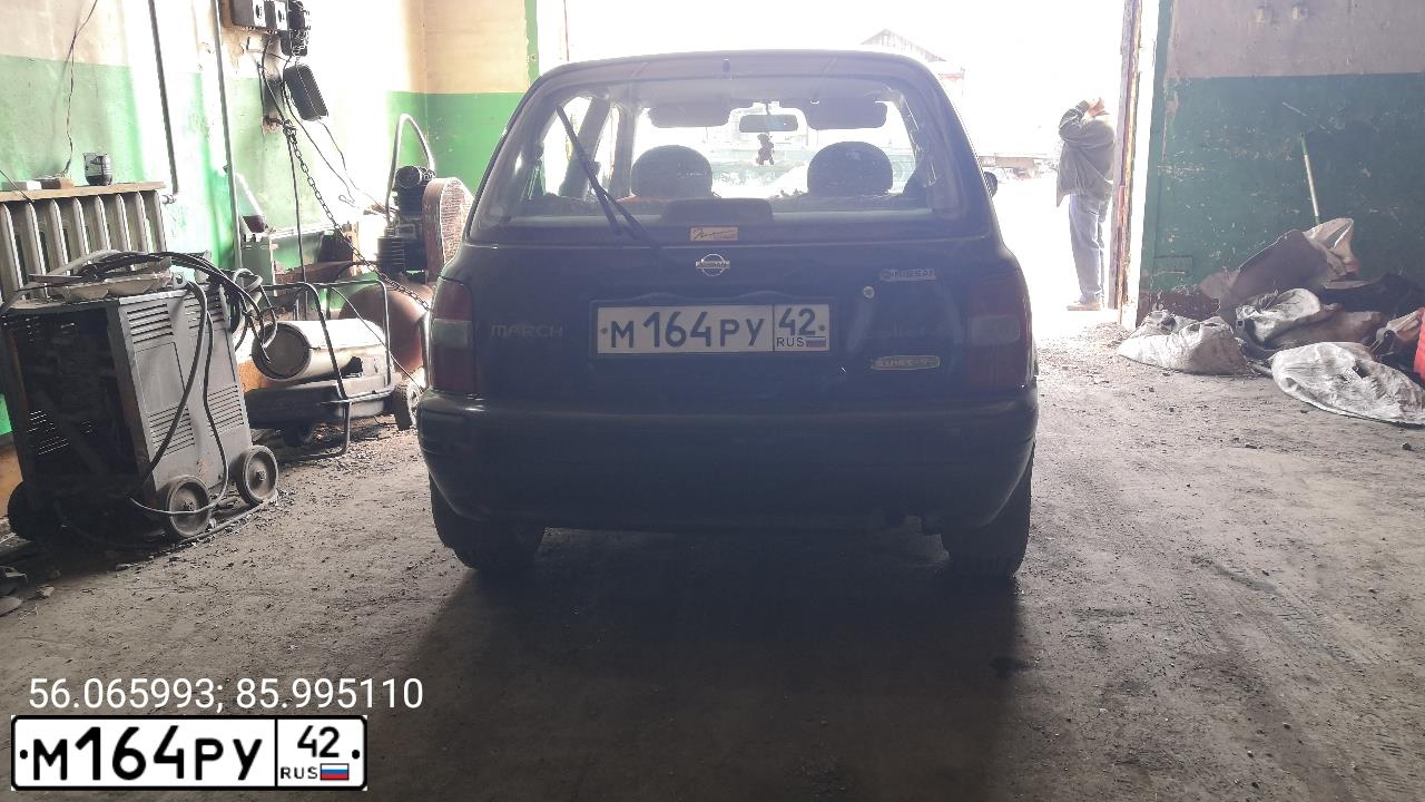 Фото автомобиля Nissan March, 1999 — госномер М164РУ42