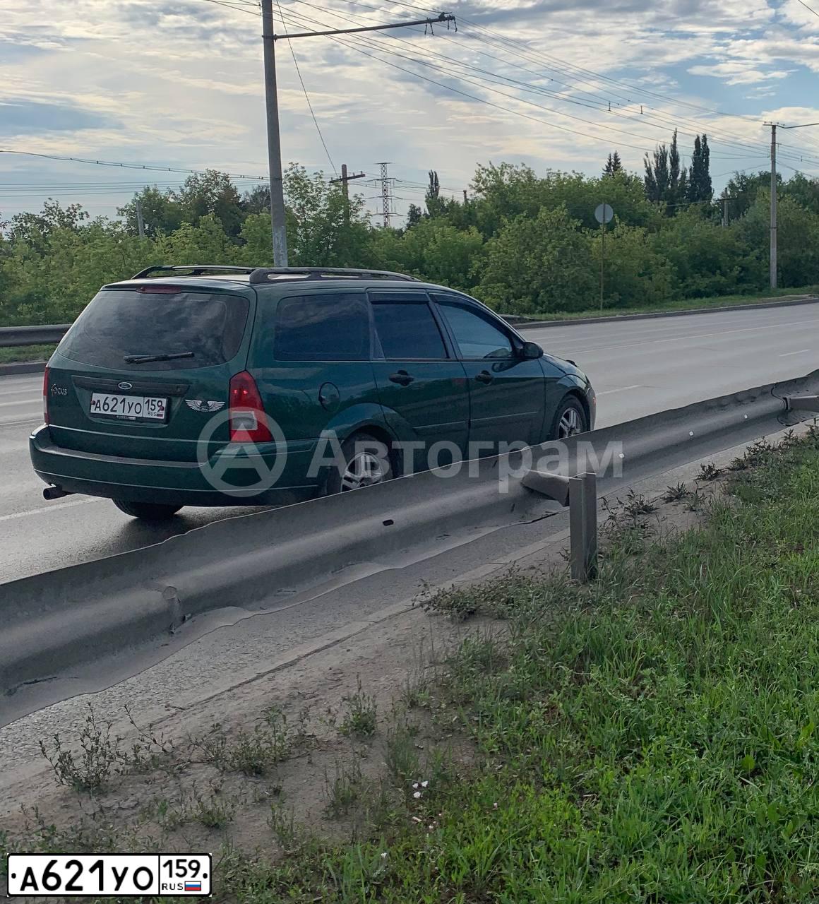 Фото автомобиля FORD FOCUS, 2001 — госномер А310РЕ155. Цвет: ЗЕЛЕНЫЙ