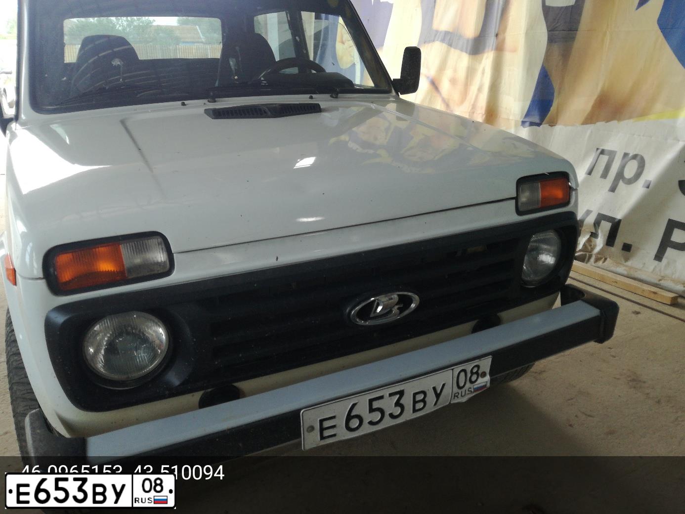 Фото автомобиля LADA 2121 NIVA, 1983 — госномер А009АР08. Цвет: Белый